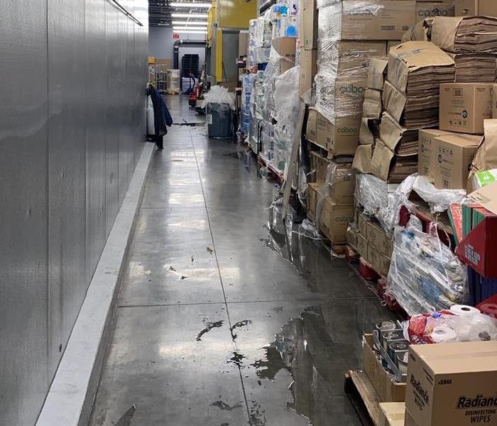 Super market with water damage and wet boxes 