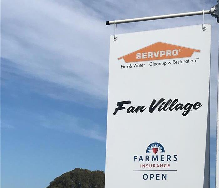 SERVPRO logo in the Farmers Insurance Open event sign 